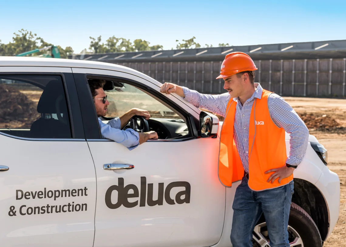 Deluca construction site and vehicle branding