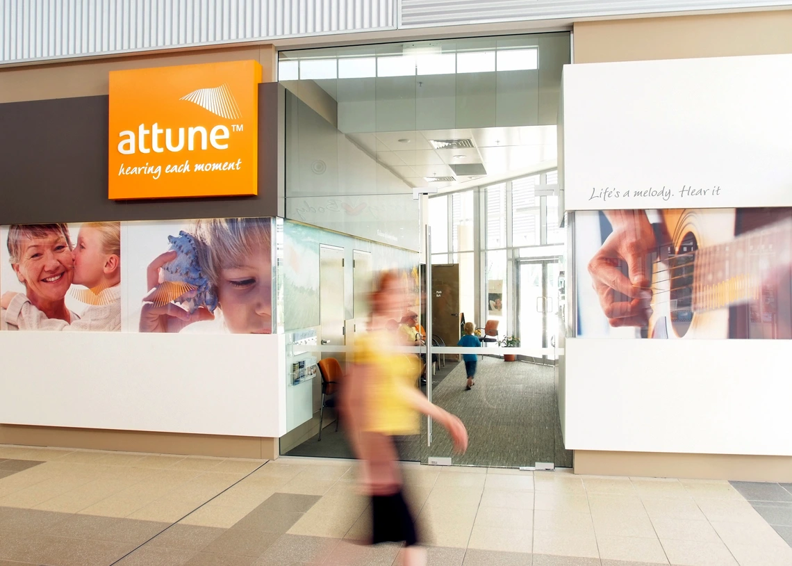 Attune Hearing clinic sign system featuring supergraphics