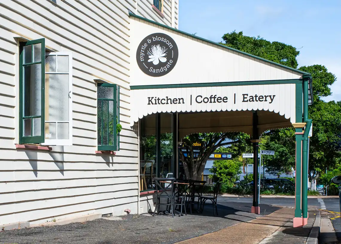 Myrtle & Blossom's pavement signage